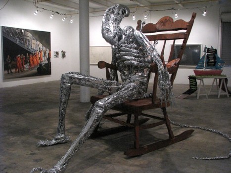 'Monarch,' a giant alien sculpture in a rocking chair, by David Herbert.